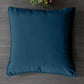 Soft decorative pillow covers in a living room setting.