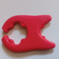 Kitchen utensil holder made of heat-resistant plastic featuring playful cat ear design