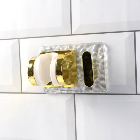 Wall mounted broom and mop holder with strong grip clips for space saving cleaning tool organization