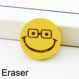 Bright yellow Smiley Eraser, perfect for kids' schoolwork.