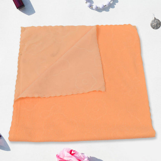 Claranza hand towel shown wiping a kitchen counter.