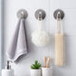Sleek stainless steel hook securely mounted on a wall, ready for use.