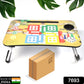 Portable Ludo laptop desk for kids comfortably set up on a bed.
