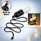 Black LED Pull Cord Light hanging, illuminated brightly to show its white light.
