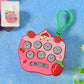 Strawberry cartoon push button keychain toy with 9 tactile pop bubbles