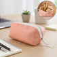 Durable PU leather cosmetic & pencil pouch with zip closure on a white background.