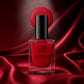 Vibrant red matte nail polish bottle with a smooth finish.