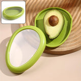 Green oval vegetable container with lid closed