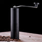 Siplix portable stainless steel manual coffee grinder standing upright.