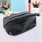 Black waterproof travel makeup organizer pouch with zipper and stitched handle
