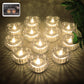 Set of 12 heart-shaped LED flameless decorative candles emitting warm light