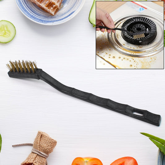 Mini Brass Wire Brush for cleaning and rust removal, held against a white background.