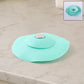 Light green silicone sink strainer and seal cover preventing kitchen clogs