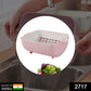 Ergonomic double-layered strainer with handles, ideal for kitchen tasks.