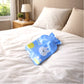 Front view of reusable hot and cold water bag with cartoon design