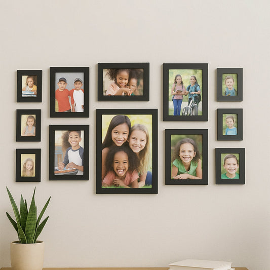 12-piece black photo frame set arranged as a wall gallery collection