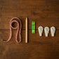 Complete 6-in-1 wall hanging measurement tool kit laid out on table