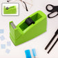 Heavy-duty plastic tape dispenser cutter with an orange handle, ready for packaging tasks.