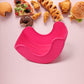 Silicone Burger Holder in use, keeping a hamburger neat.