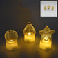 Set of three white flameless LED candles glowing warmly in a decorative arrangement.