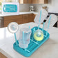 Baby feeding bottle drying rack with hygienic removable drip tray on countertop