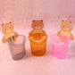 Wall-mounted teddy bear toothbrush holder for kids in bathroom