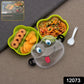 Top view of the cute froggy lunch box, showing its secure clips and spoon.