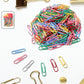 Set of multicolor paper clips with smooth vinyl coating for office use