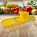 Yellow vegetable and fruit slicer with built-in container on white background