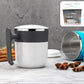 Front view of a sleek, black insulated coffee mug with its spill-proof lid.