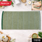 Soft cotton bath towel neatly folded for daily use and travel
