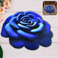3D blue rose shaped anti-slip velvet floor mat in a home setting