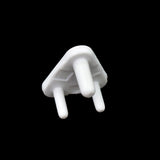 White baby socket covers, a pack of 100 electrical plug protectors for child safety.