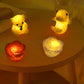 A single LED Crystal Night Light illuminating a dark room with a warm glow.