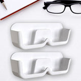 Organivo Sunglass Wall Organizer mounted on a white wall, showcasing easy adhesive installation.