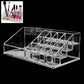 Front view of acrylic makeup and jewelry organizer with sixteen compartments