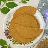 Pack of Maniarr's Carmonised Ragi Khakhra (180g) showing crispy texture.