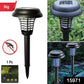Solar powered UV LED mosquito zapper light illuminating outdoor area