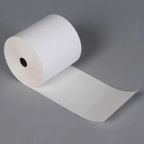 Thermal label roll for barcode printing showing crisp print and self-adhesive backing