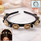 Gold stone studded hairband with luxurious design