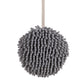 Plush hanging hand towel with convenient loop for easy placement.