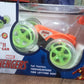 The rechargeable stunt car from Wagtail, highlighting its robust wheels and bright lights.