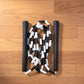 Neutral background image of fitness gear including skipping rope
