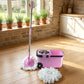 A person effortlessly cleaning a floor with the Quick Spin Mop.