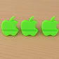 Assorted color apple-shaped mobile phone stands displayed together