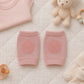 Side view of toddler pink wool knit knee protectors with cushion pads