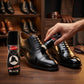 Leather shoes with shiny black polish applied by Maxwax