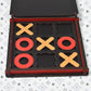 Side view of the compact wooden Tic Tac Toe game, highlighting its portability.