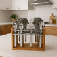 24-piece stainless steel cutlery set displayed on wooden stand
