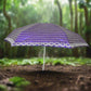 Demonstration of the umbrella's strong canopy offering reliable sun and rain protection.